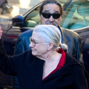 Josiane Balasko et son mari George Aguilar - Sortie des Obsèques de Michel Blanc en l'église Saint-Eustache à Paris, le 10 octobre 2024. © Moreau / Jacovides / Bestimage 