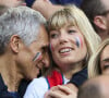 Et c'est en plein coeur de Paris qu'ils ont trouvé leur nid douillet idéal pour eux et leurs enfants.
Nagui et sa femme Mélanie Page - Célébrités dans les tribunes du match du groupe D de l'Euro 2024 entre l'équipe de France face à l'Autriche (1-0) à Dusseldorf en Allemagne le 17 juin 2024. © Cyril Moreau/Bestimage