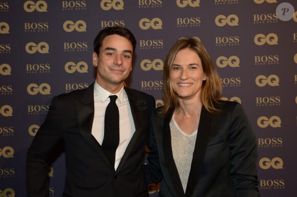 Julian Bugier et sa femme Claire Fournier lors de la soirée "L'homme de l'année GQ 2014" au Musée d'Orsay, à Paris le 19 novembre 2014. 