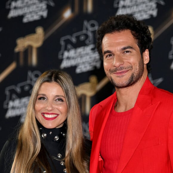 Le chanteur a livré une prestation qui restera gravée dans l'histoire de l'évènement
Amir et sa femme Lital, enceinte de leur troisième enfant, au photocall de la 26ème édition des NRJ Music Awards à Cannes, le 1er novembre 2024. Mariés depuis dix ans, Amir et Lital Haddad vont prochainement agrandir la famille, déjà composée de leurs enfants, Mikhaël et Or. © Bebert / Guignebourg / Bestimage 