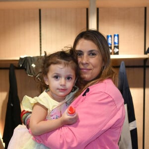 Marion Bartoli et sa fille Kamilya - Lancement de la collection Mouratoglou au magasin Celio Ternes à Paris le 25 mai 2023. Le coach Patrick Mouratoglou lance sa collection de vêtements 100% tennis distribuée en France par célio et déjà visible sur le circuit. © Veeren/Bestimage