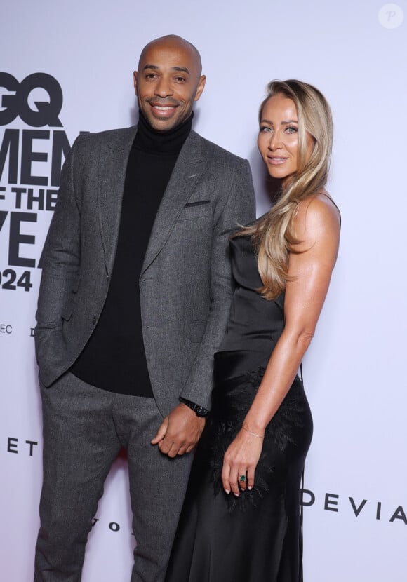 Thierry Henry et sa femme Andrea Rajacic - People au photocall de la soirée "GQ Men of the Year awards 2024" à l'hôtel Plaza à Paris. Le 20 novembre 2024 © Denis Guignebourg / Bestimage