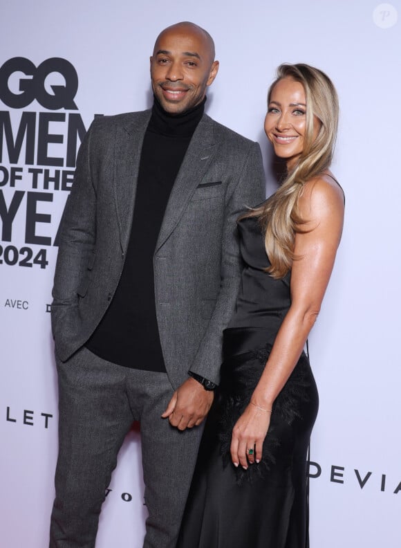 Thierry Henry et sa femme Andrea Rajacic - People au photocall de la soirée "GQ Men of the Year awards 2024" à l'hôtel Plaza à Paris. Le 20 novembre 2024 © Denis Guignebourg / Bestimage