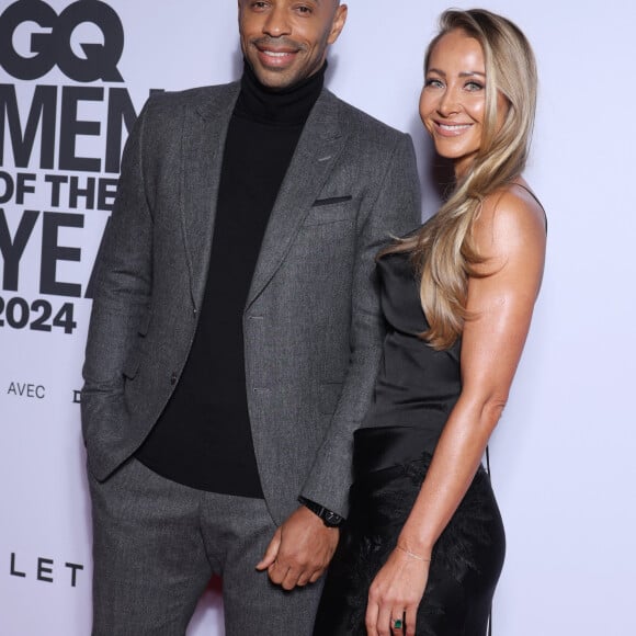 Thierry Henry et sa femme Andrea Rajacic - People au photocall de la soirée "GQ Men of the Year awards 2024" à l'hôtel Plaza à Paris. Le 20 novembre 2024 © Denis Guignebourg / Bestimage