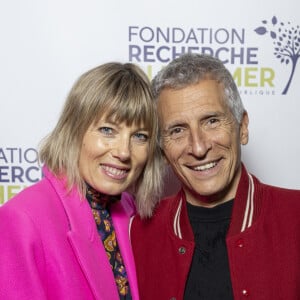 Nagui et sa femme Mélanie Page au photocall du concert du gala des 20 ans de la fondation Recherche Alzheimer "2 générations chantent pour la 3ème" à l'Olympia à Paris le 18 mars 2024. © Cyril Moreau / Bestimage 