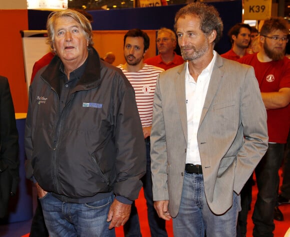 Olivier de Kersauson et Michel Desjoyeaux lors de l'inauguration du 55ème Salon Nautique porte de Versailles à Paris le 4 décembre 2015. 