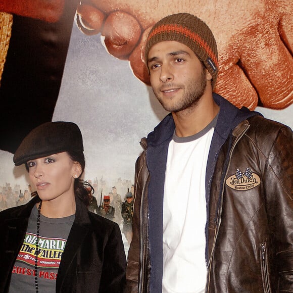 La chanteuse française Jenifer et son ex-petit ami Maxime à la première de 'Joyeux Noel' réalisé par Gilles Marchand, qui s'est tenue à l'UGC Normandie sur l'avenue des Champs Elysées à Paris, France, le 03 novembre 2005.