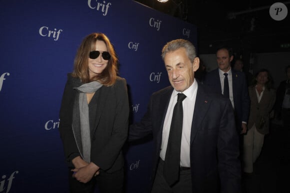 "Mais ce n'est pas facile parce que j'ai des enfants de mères différentes, et en même temps ils se sentent vraiment frères et soeurs", a rapporté l'ex-maire de Neuilly-sur-Seine.
Nicolas Sarkozy et Carla Bruni Sarkozy lors d'une cérémonie organisée par le Conseil des institutions juives de France (CRIF) en hommage aux victimes des attentats du Hamas du 7 octobre 2023 contre Israël, à l'occasion du premier anniversaire de l'événement, à Paris, le 7 octobre 2024. © Jack Tribeca / Bestimage