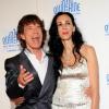 Mick Jagger et sa compagne L'Wren Scott assistent à la projection du documentaire Stones in Exile, à Cannes, dans le cadre de la Quinzaine des Réalisateurs, mercredi 19 mai 2010.