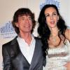 Mick Jagger et sa compagne L'Wren Scott assistent à la projection du documentaire Stones in Exile, à Cannes, dans le cadre de la Quinzaine des Réalisateurs, mercredi 19 mai 2010.