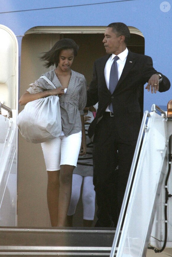 Barack Obama et sa famille arrivent à Chicago. Ils descendent de l'avion Air Force One. 27/05/2010