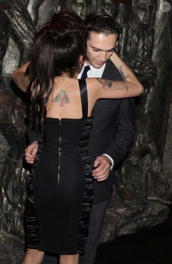 Amy Winehouse et son petit ami Reg Traviss, août 2010