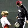 David Beckham et son fils Romeo viennent soutenir le petit Cruz, 5 ans, qui joue un match de foot à Santa Monica, samedi 9 octobre.