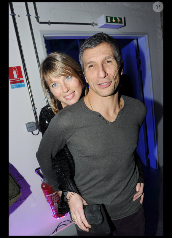 Nagui et sa femme Mélanie à l'anniversaire de Jean-Charles de Castelbajac, organisé à la Cité de la mode et du design, à Paris. 15/12/2010