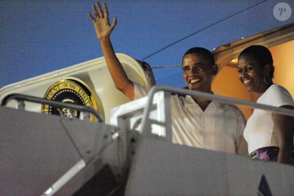 Barack et Michelle Obama lors de leur départ pour Washington ce mardi 4 janvier 2011