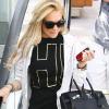 Lindsay Lohan se rend à la salle de gym avec le Birkin d'Hermès, version noire.