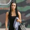 Kim Kardashian se rend à la salle de gym avec un sac Hermès noir.