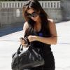 Kim Kardashian porte un sac Balenciaga pour sa séance de sport.