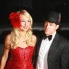 Paris Hilton, entourée de son petit ami Cy Waits, participe à une soirée "prostituées et proxénètes" pour son 30e anniversaire, mardi 15 février, à Los Angeles.