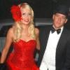 Paris Hilton, entourée de son petit ami Cy Waits, participe à une soirée "prostituées et proxénètes" pour son 30e anniversaire, mardi 15 février, à Los Angeles.