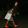 Barack Obama et sa famille lors de leur départ pour le Brésil le 19 mars 2011 