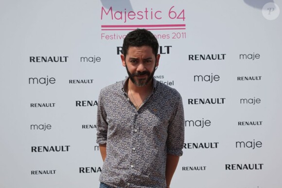 Manu Payet sur la plage du Majestic 64 à Cannes le 12 mai 2011