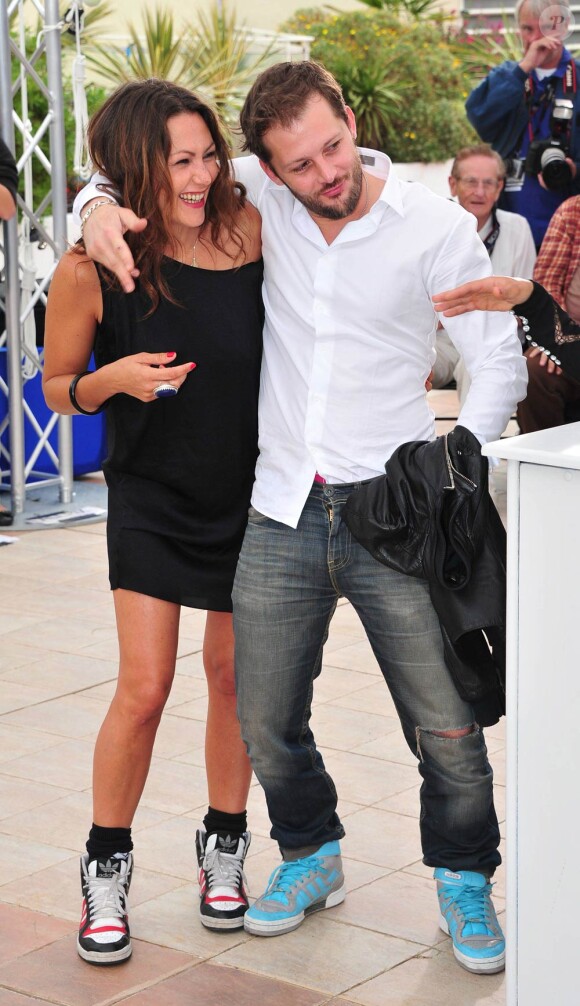 Karole Rocher et Nicolas Duvauchelle à l'occasion du photocall de Polisse, présenté aujourd'hui au 64e Festival de Cannes, le 13 mai 2011.