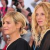 Marina Foïs et Sandrine Kiberlain à l'occasion du photocall de Polisse, présenté aujourd'hui au 64e Festival de Cannes, le 13 mai 2011.