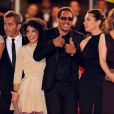 JoeyStarr et une partie de l'équipe du film lors de la montée des marches de  Polisse , lors du 64e Festival de Cannes, le 13 mai 2011.