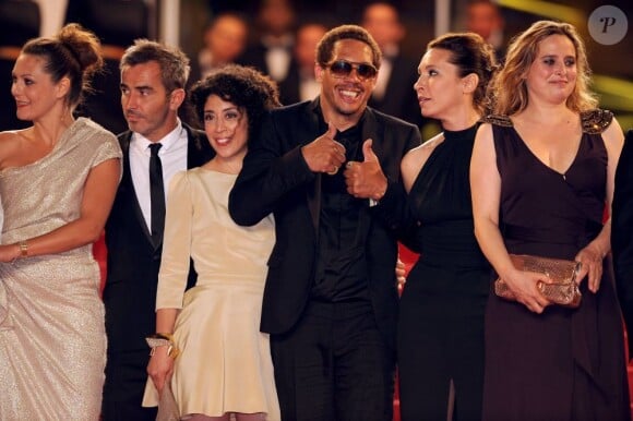 JoeyStarr et une partie de l'équipe du film lors de la montée des marches de Polisse, lors du 64e Festival de Cannes, le 13 mai 2011.