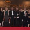 Charlotte Gainsbourg, Kirsten Dunst et le réalisateur lors de la projection du film Melancholia, de Lars Von Trier, le 18 mai 2011, au 64e festival de Cannes.