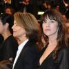 Charlotte Gainsbourg et Charlotte Rampling lors de la projection du film Melancholia, de Lars Von Trier, le 18 mai 2011, au 64e festival de Cannes.