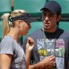 La superbe Russe Maria Sharapova, 24 ans, numéro 7 mondial, aborde Roland-Garros dans les meilleures conditions : victorieuse à Rome, elle peut compter sur le soutien de son fiancé Sasha Vujacic, comme lors de son entraînement Porte d'Auteuil, le 18 mai 2011.