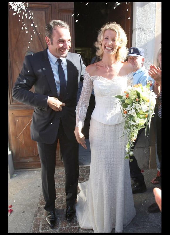 Jean Dujardin et Alexandra Lamy lors de leur mariage en juillet 2009