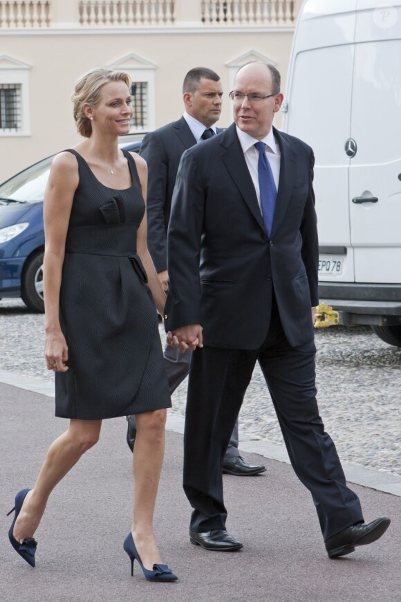 Charlene Wittstock et le prince Albert de Monaco assistent aux fêtes de  la Saint-Jean à une semaine de leur mariage (les 1e et 2 juillet prochain). Monaco, 23 juin 2011
