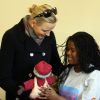 La princesse Charlène Wittstock lors de sa rencontre avec Desmond Tutu  en Afrique du Sud au Cap, où elle est devenue co-marraine de  l'association Giving Organisation Trust le 8 juillet 2011