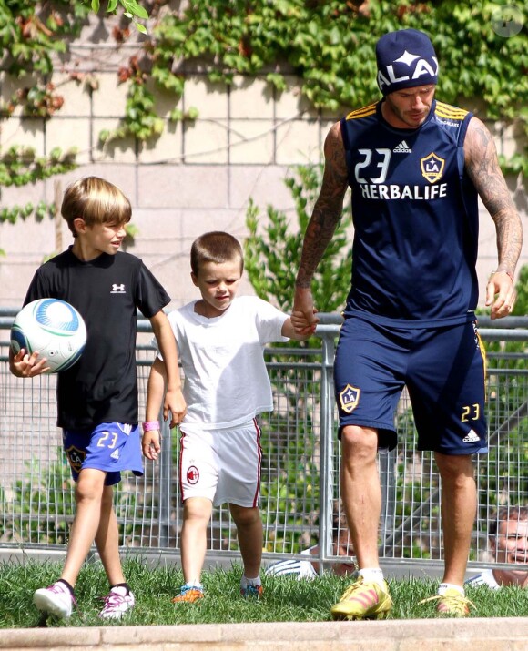 David Beckham, à Los Angeles, le 15 juillet, avec ses fils Romeo et Cruz.