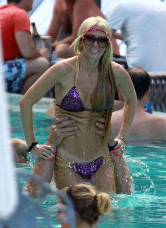 Jenna Jameson et son compagnon Tito Ortiz en vacances à Miami le 13 août 2011