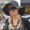 Paris Hilton sort de l'Hôtel Costes pour se faire un peu de shopping chez Colette à Paris le 30 août 2011