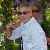 George Clooney apparaît souriant et détendu alors que son film, Les Marches du pouvoir, ouvre ce mercredi soir la 68e Mostra de Venise, le 31 août 2011.