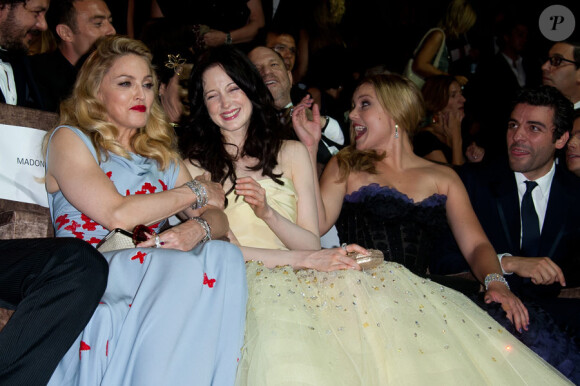 Madonna habillée par Vionnet, Andrea Riseborough en Dior, et Abbie Cornish en Atelier Versace lors de l'avant-première du film W.E. au festival de Venise le 1er septembre 2011