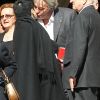 Alain Delon est venu assurer Zizi Jeanmaire de sa tendresse et son affection lors de la messe en hommage à Roland Petit en l'église St Roch à Paris,  le 23 septembre 2011. Le chorégraphe est décédé le 10 juillet dernier à  Genève.