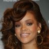 Le canon de beauté Rihanna, revenue à une couleur de cheveux plus conventionnelle, a charmé la capitale anglaise pour le lancement de son parfum Reb'L Fleur. Londres, le 19 août 2011.