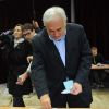 Dominique Strauss-Kahn vote au premier tour des primaires socialiste, à Sarcelles, le 9 octobre 2011.