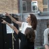 La princesse Mary visite le Greenhouse Project (des potagers sur les toits des écoles de New York) dans une école de Manhattan, le 24 octobre 2011, en présence du chef danois du Noma Rene Redzepi.