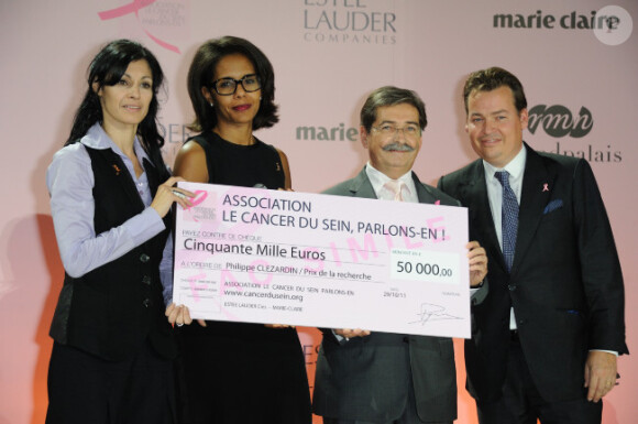 Marie-Claude Pietragalla et Audrey Pulvar auprès du PDG Estee Lauder Henk Van den Mark lors la soirée Pink Ribbon, un évènement pour la lutte contre le cancer du sein, au Grand Palais le 29 octobre 2011 à Paris
 
 
