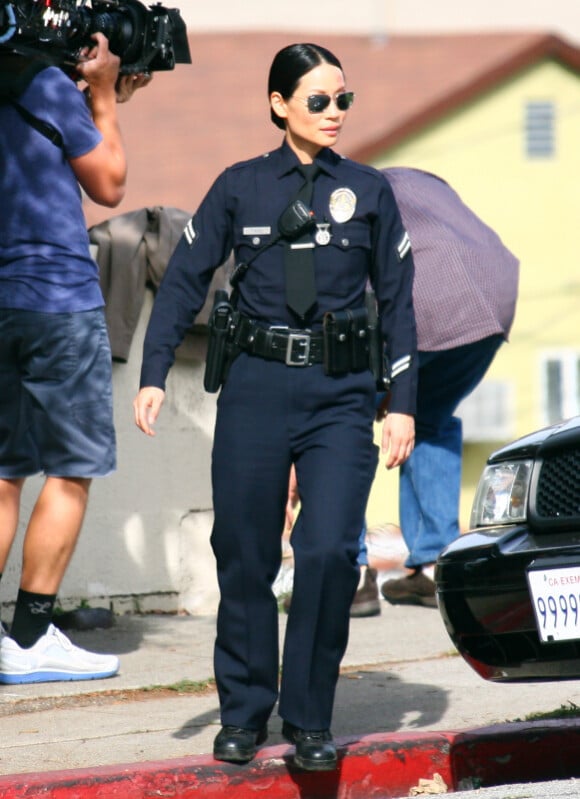 Lucy Liu fait régner la loi sur le tournage de Southland, à Los Angeles le 28 novembre 2011.
