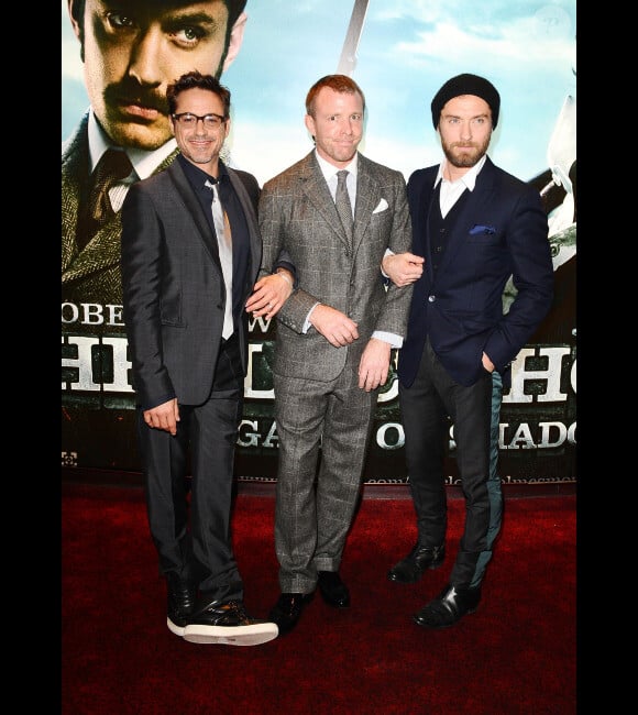 Robert Downey Jr., Guy Ritchie et Jude Law présentent Sherlock Holmes : Jeu d'ombres à Londres, le 9 décembre 2011.