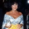 Elizabeth Taylor et Larry Fortensky, le 1er décembre 1997 à Los Angeles (archives).