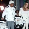 Mariah Carey amincie et Nick Cannon, tout de blanc, sortent leurs jumeaux Monroe et Moroccan, à Aspen, pour le réveillon du 31 décembre 2011